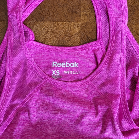 Reebok Pink Sleeveless Fitted Cut Out Tank T. Size XS - Picture 2 of 7
